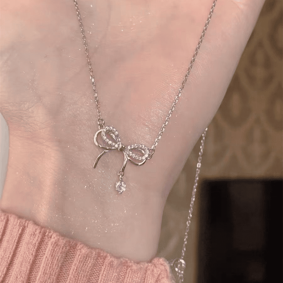 Elegant Silver Bowknot Pendant Necklace for Women - Fashionable Alloy Jewelry