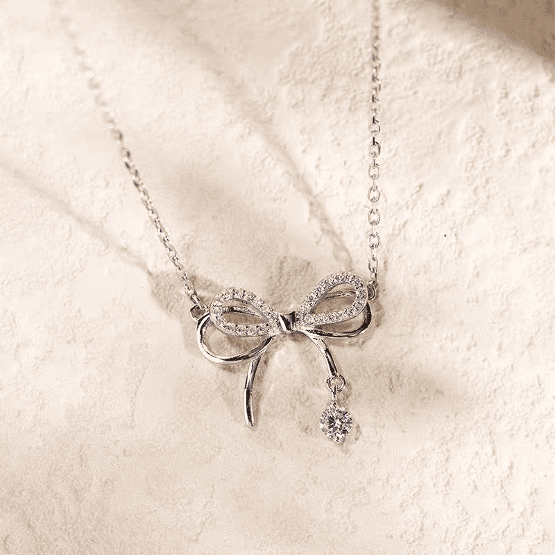Elegant Silver Bowknot Pendant Necklace for Women - Fashionable Alloy Jewelry