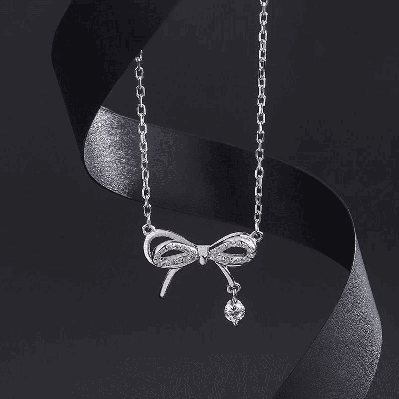 Elegant Silver Bowknot Pendant Necklace for Women - Fashionable Alloy Jewelry